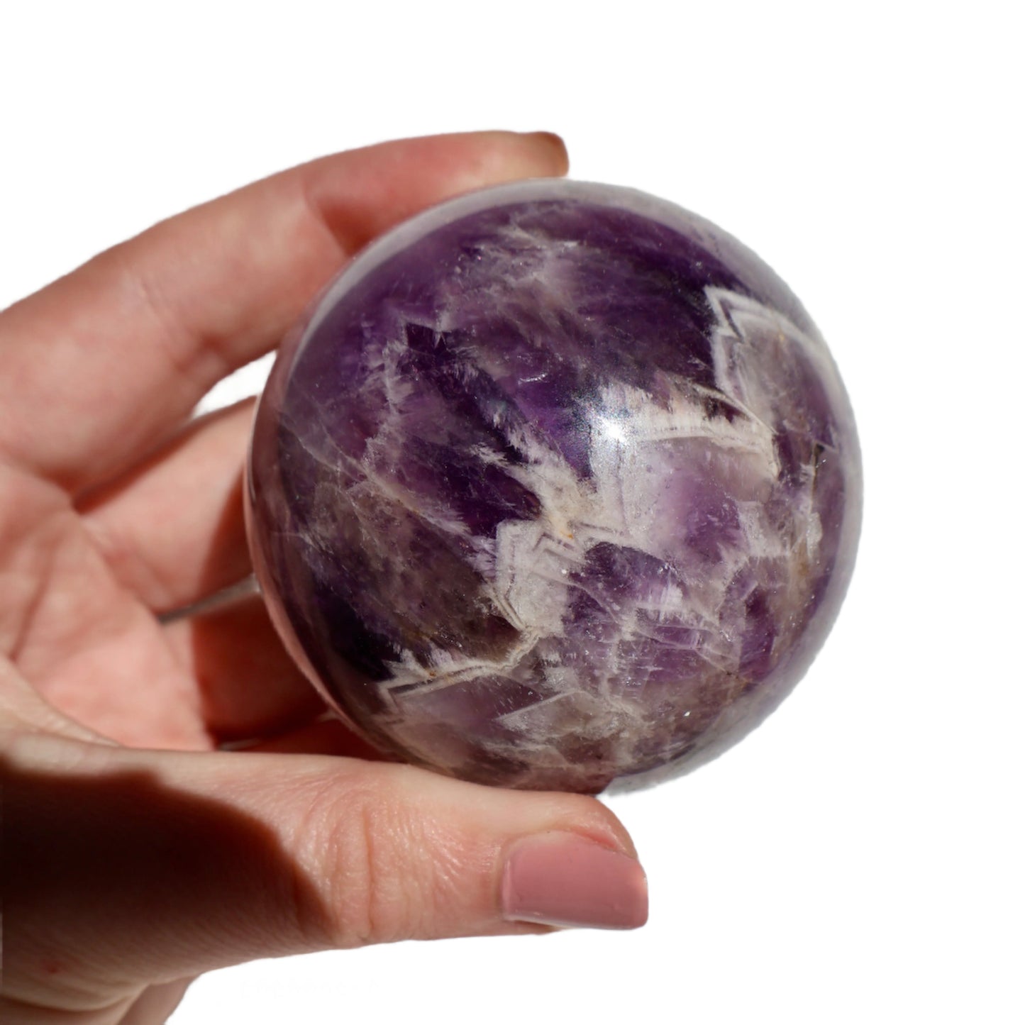 Purple Chevron Amethyst Crystal Sphere in Hand