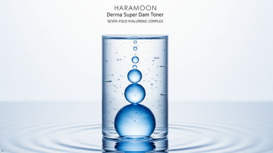 Flat lay of a minimalist hyaluronic acid toner bottle on a clean surface with soft botanical accents — HARAMOON gentle skincare editorial