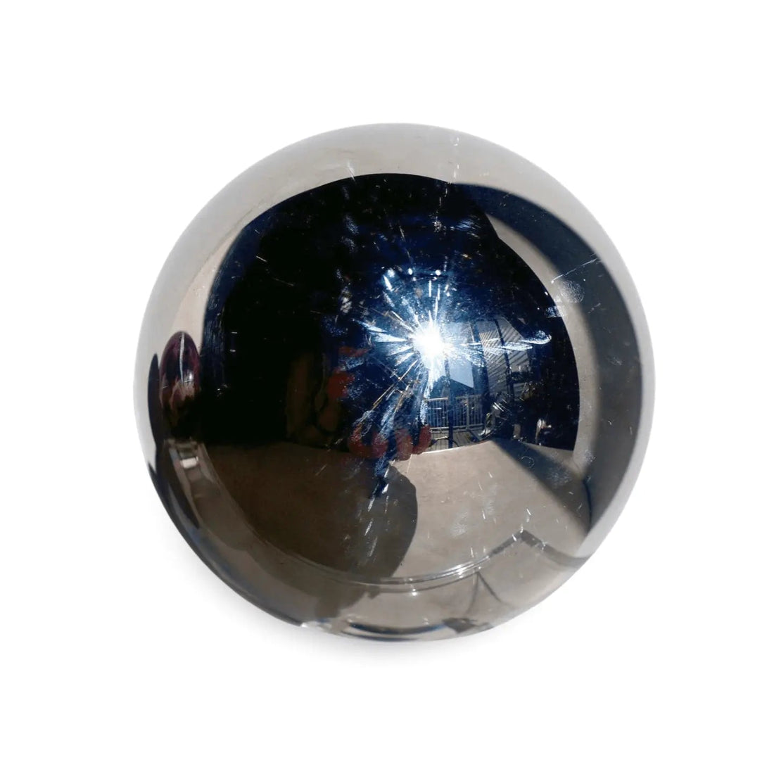 Polished Terahertz crystal sphere with a smooth metallic sheen displayed as a collector's piece — Wax | Wane crystal editorial