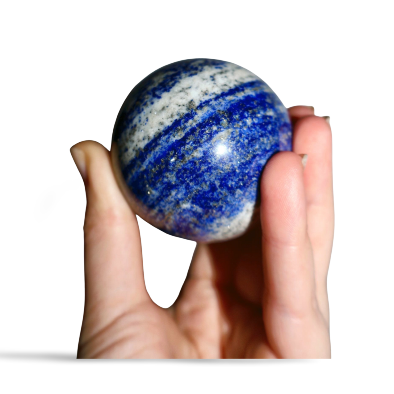 Solid gemstone ball in rich blue with natural white calcite veins and metallic gold pyrite sparkles, viewed from the side.