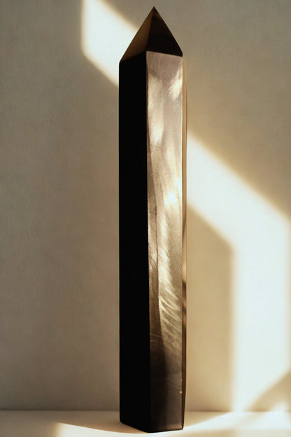 glimmering Terahertz Metal Obelisk Tower, Authentic Japanese Made, 7" in studio background