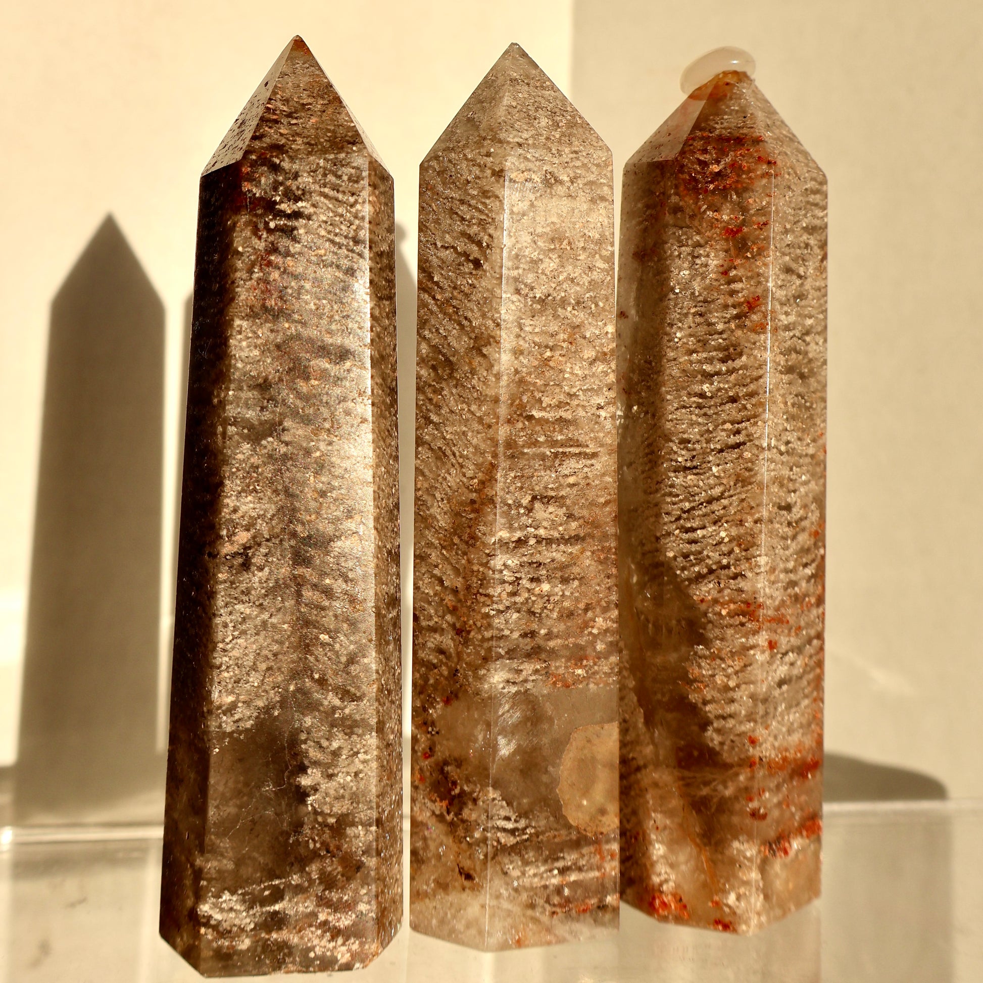 A close-up of a 3 Thousand Layer Crystal Obelisks with white golden hour as the background.