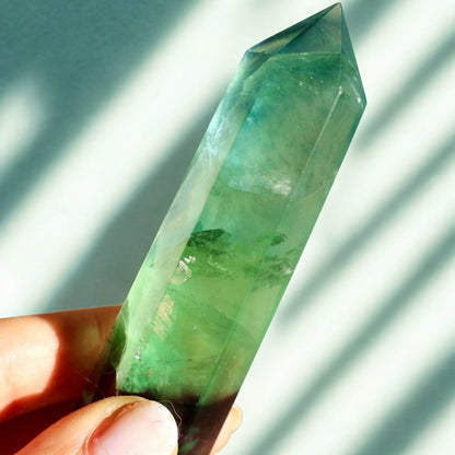 smooth Fluorite Obelisk in Green and Purple in macro texture