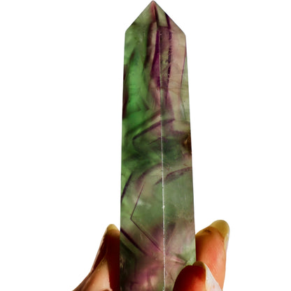 shiny Fluorite Obelisk in Green and Purple in lighting effect