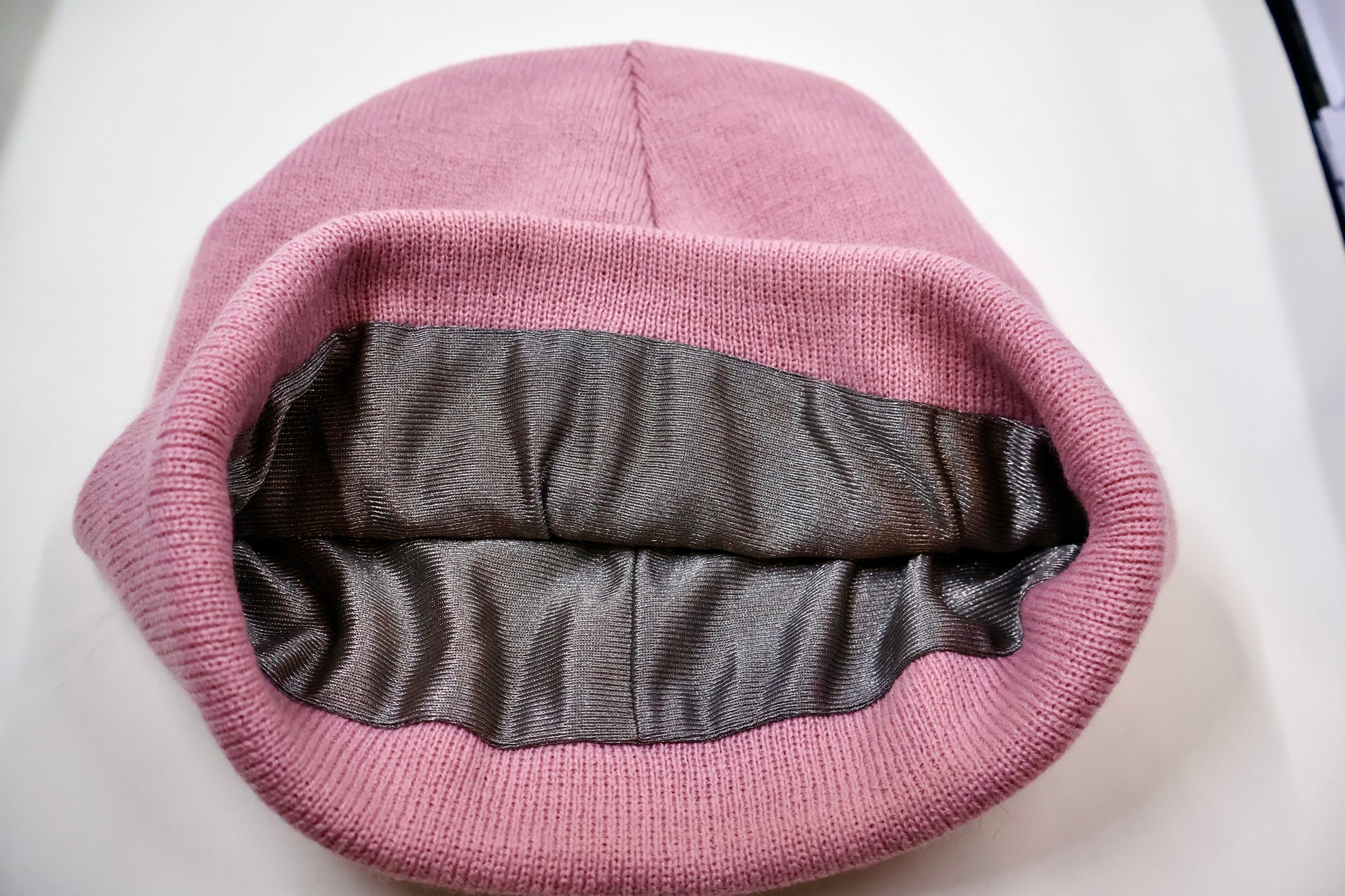 glimmering Faraday Beanie in angled view
