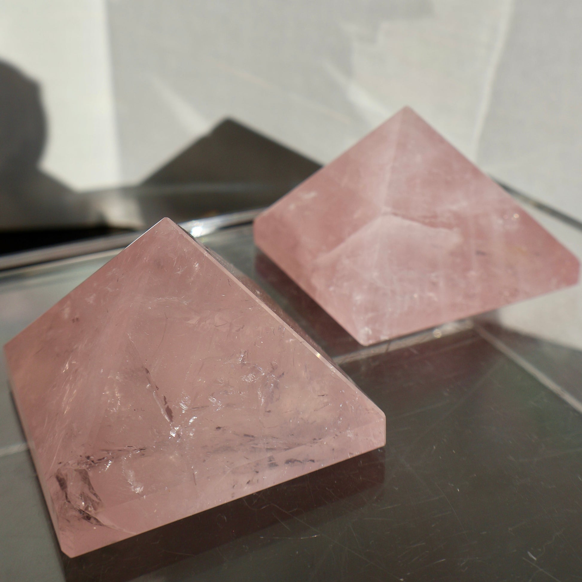 glimmering Rose Quartz Crystal Pyramid, 1.5 - 2" - Precision Cut, Love and Harmony Enhancer in angled view
