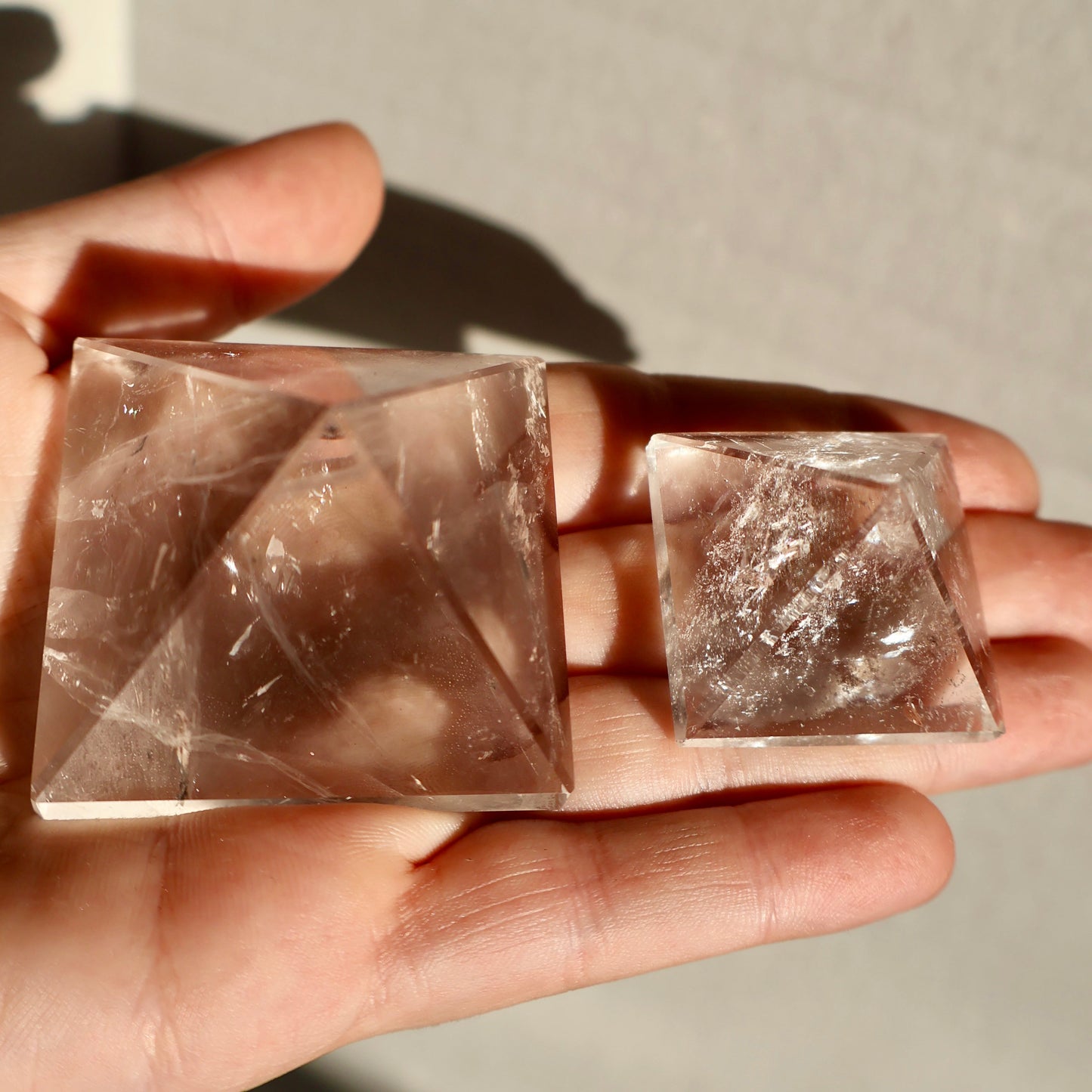 textured Clear Quartz Pyramid in displayed on surface