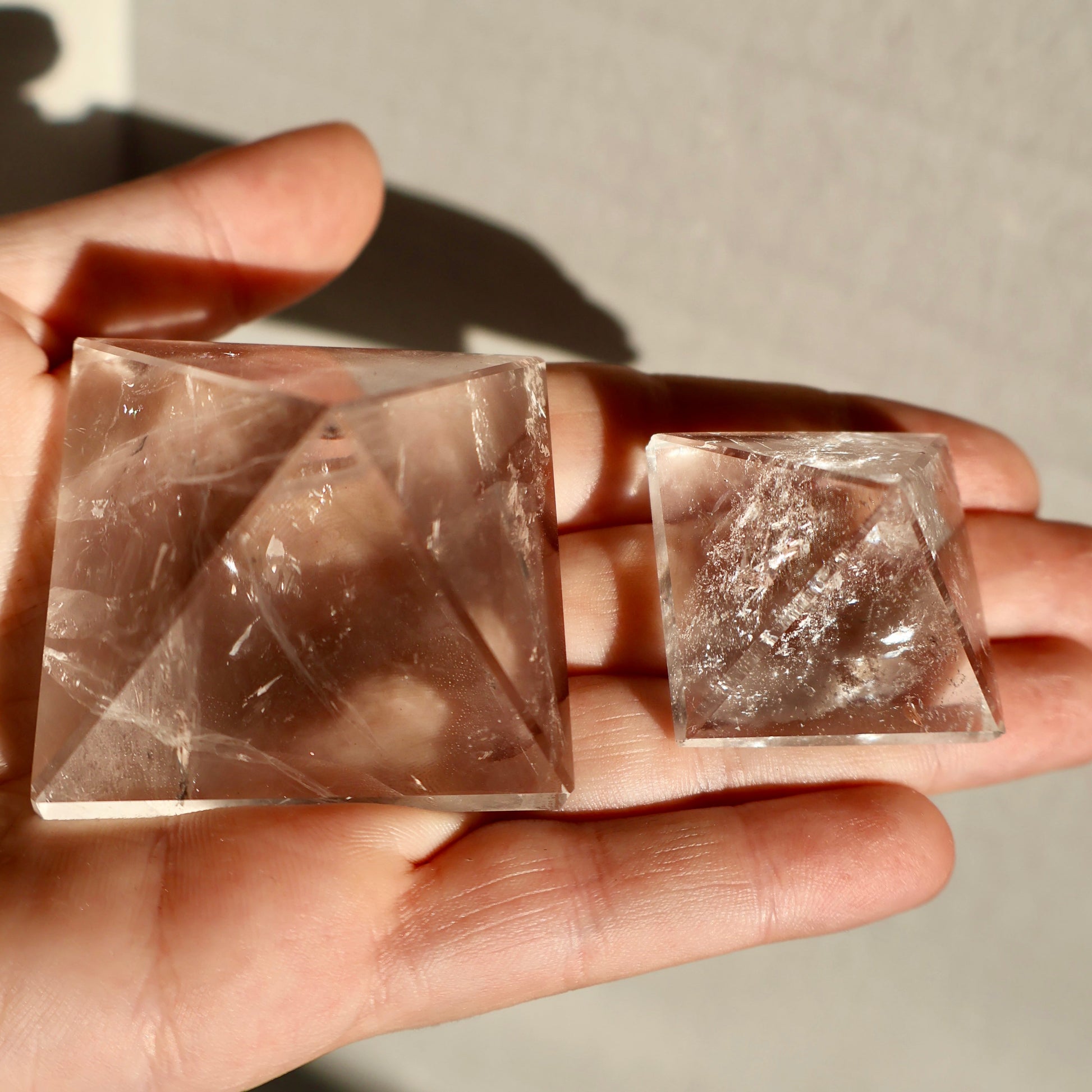 textured Clear Quartz Pyramid in displayed on surface