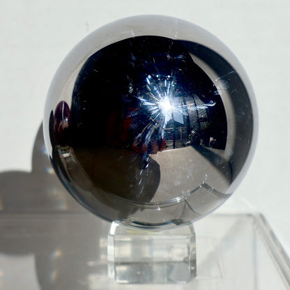sparkling Terahertz Sphere - Genuine Crystal Ball, Polished, Smooth, Rare Home Decor Accent, Decorative Sculpture in angled view
