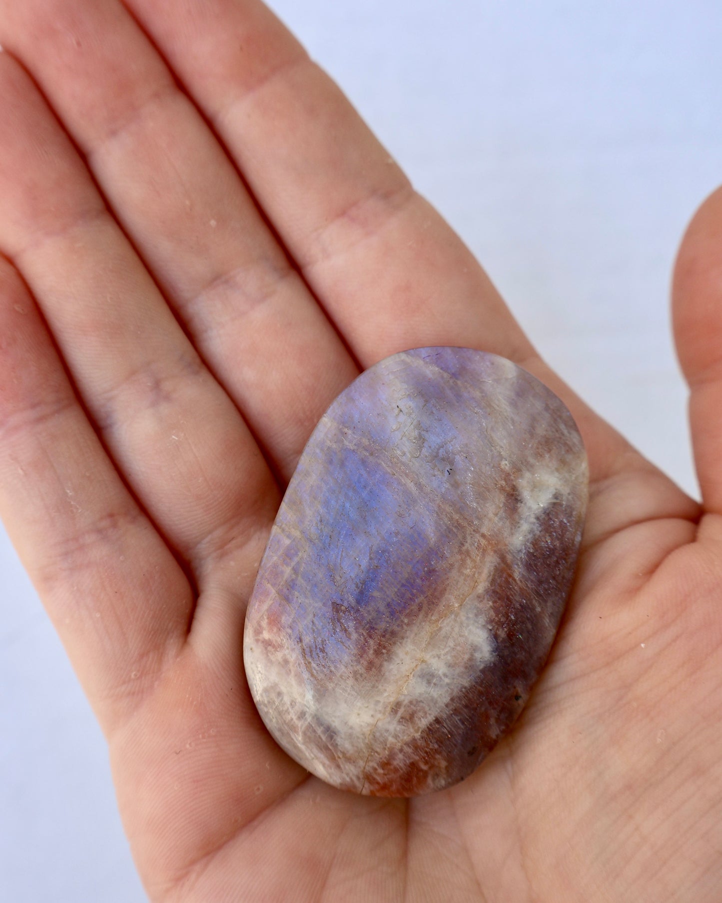 Product image of Moonstone Palm Stone with Rainbow Aura Inclusions