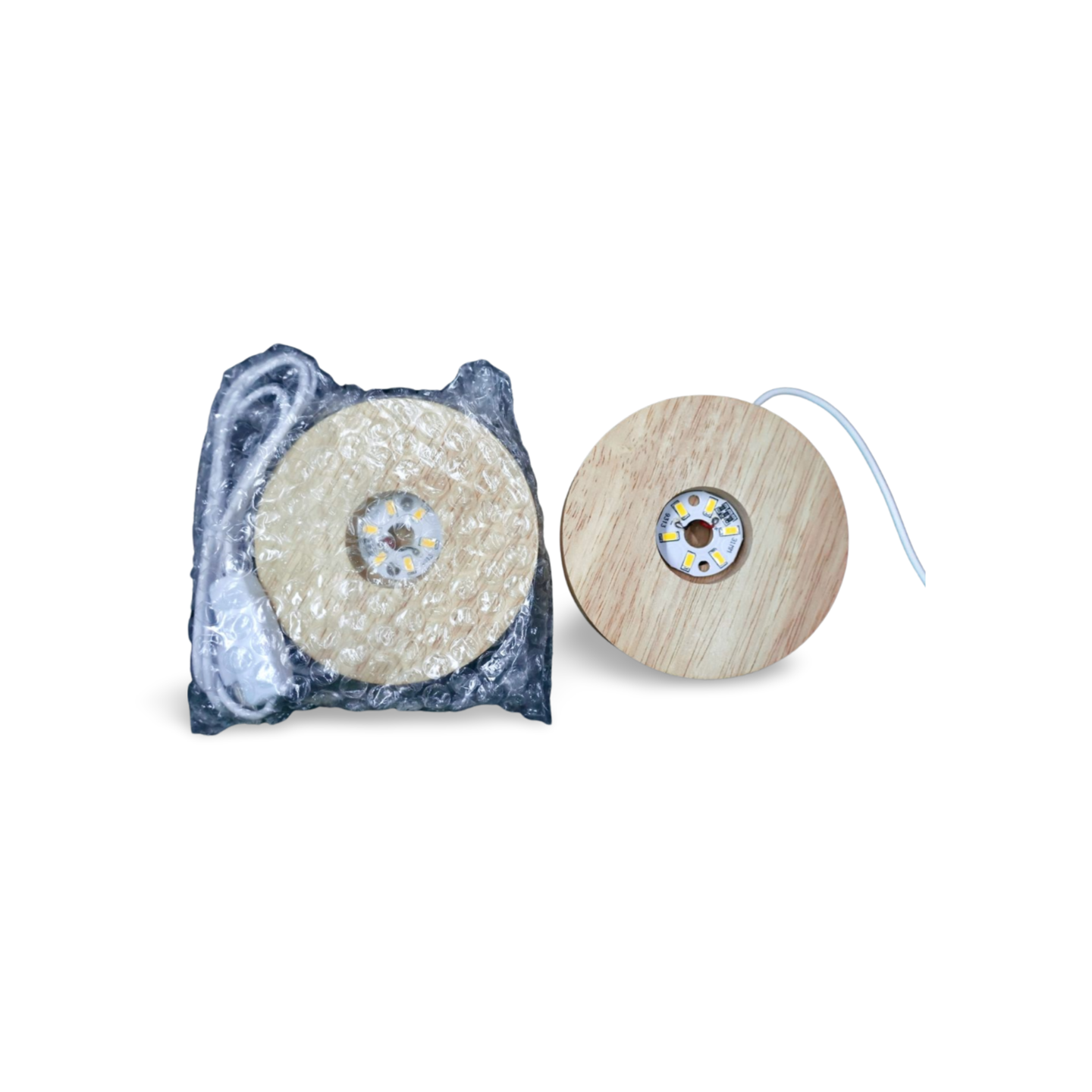 Wooden LED light base with warm glow, USB cord attached, for displaying crystals and spheres.