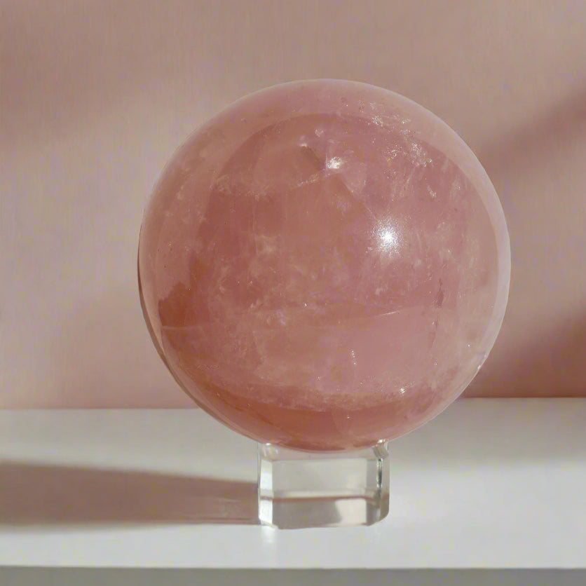 Large Rose Quartz Crystal Ball Sphere on Glass Display Stand
