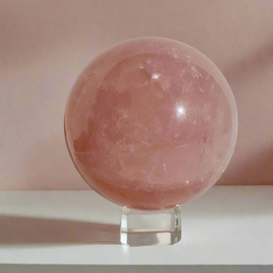 Large Rose Quartz Crystal Ball Sphere on Glass Display Stand