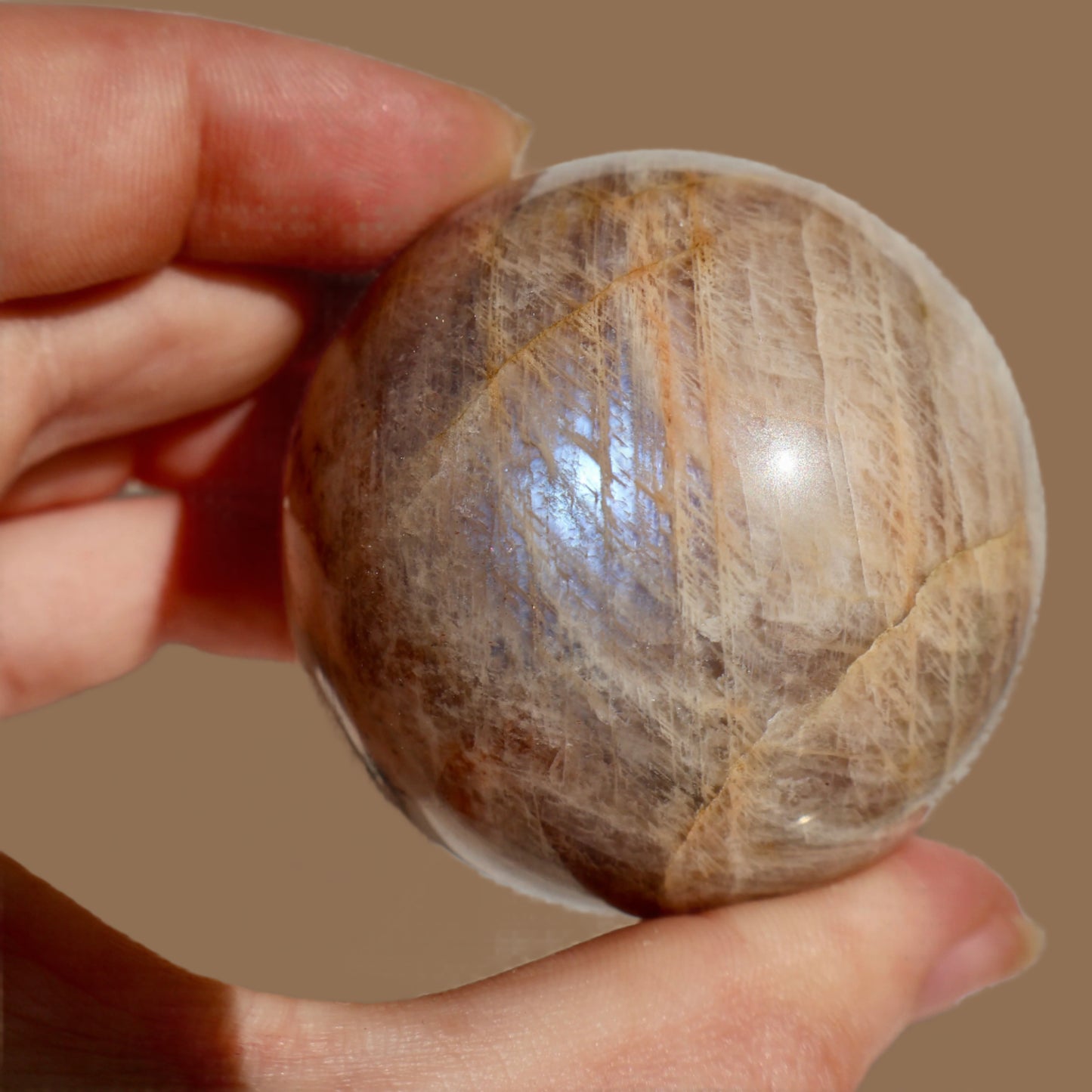sparkling Moonstone Crystal Ball - Natural Prismatic Aura, Intuition and Awareness Stone Sphere, 1.5" in close-up shot