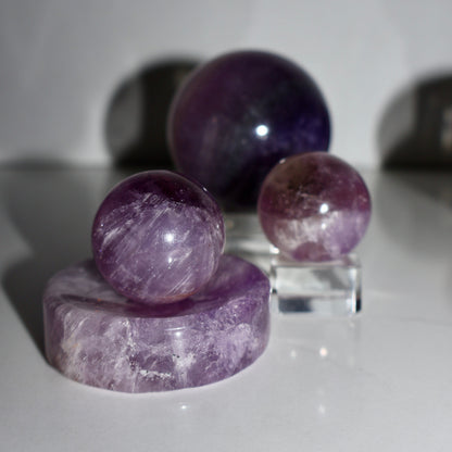 Amethyst Premium Sphere – Polished Crystal Ball of Clarity & Calm (Translucent Purple, Pocket Size ~0.75") - Wax | Wane