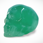Green crystal skull on a white background