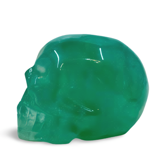 Green skull-shaped object on a white background