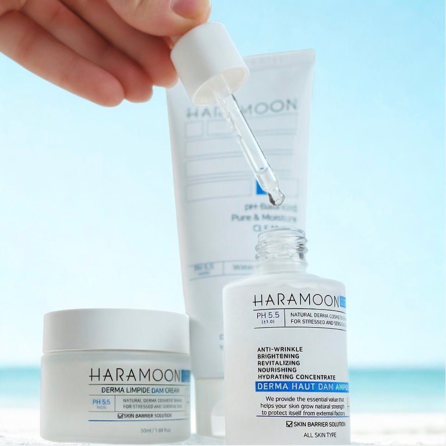Haramoon skincare products with a dropper and jar on a light blue background