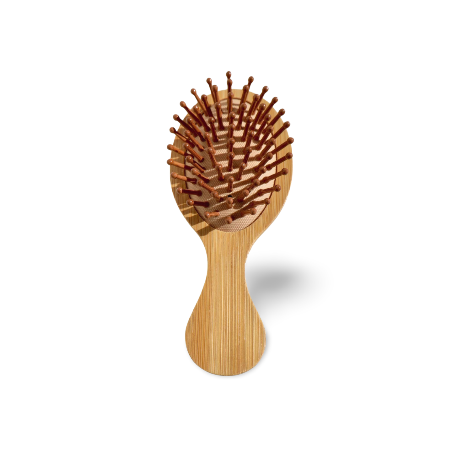 Handcrafted wooden detangling brush with ergonomic grip and rounded bristle tips, ideal for dry massage or styling